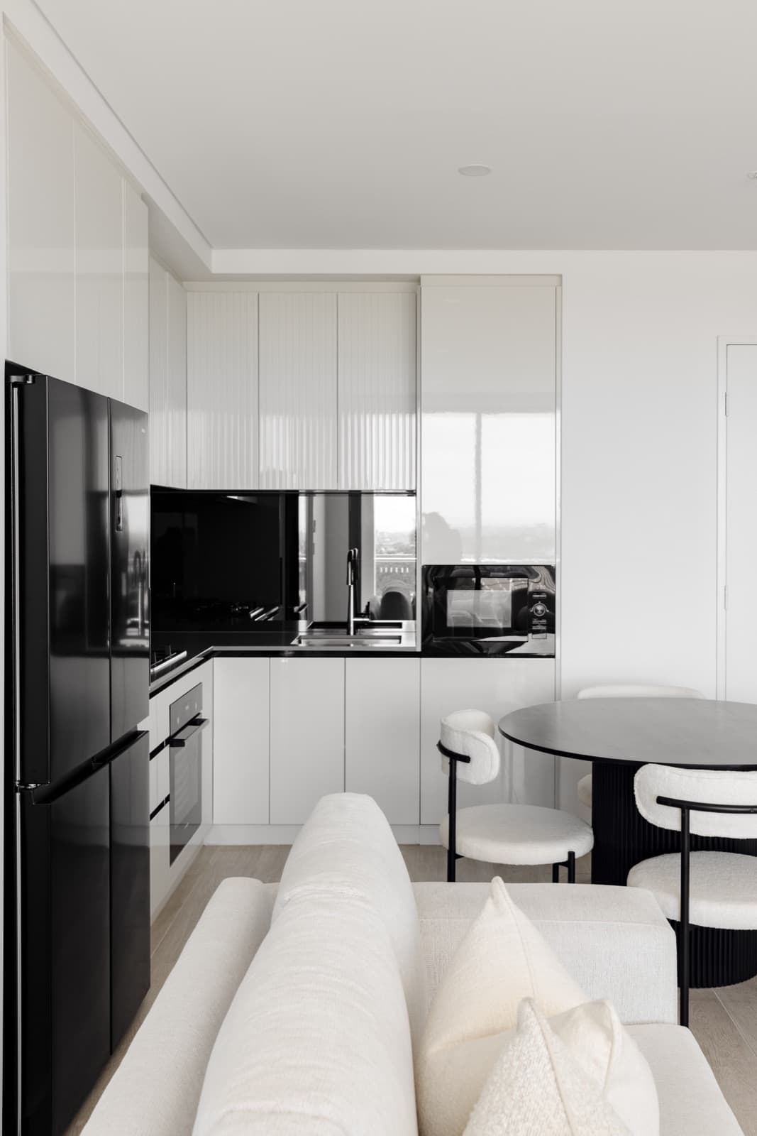 Pantry organisation with tiered shelving and matching storage containers