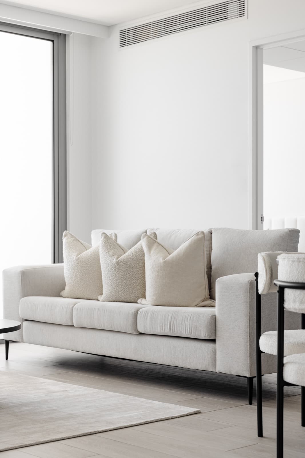 Organised living space with clear storage zones and neutral styling